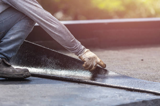 Professional Basement Waterproofing technician working in Tremont City, OH
